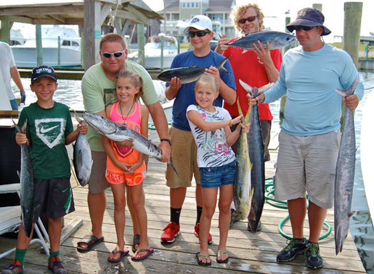 Family with fish caught on Albatross Fleet