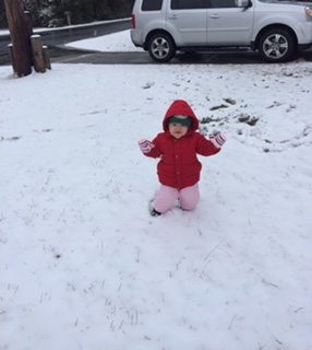 Child in snow in Kill Devil Hills