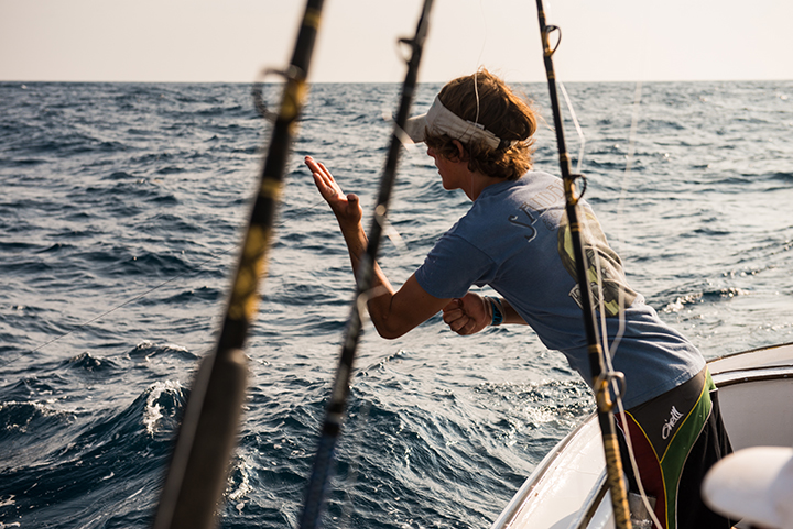 Boy fishing on the Albatross Fleet