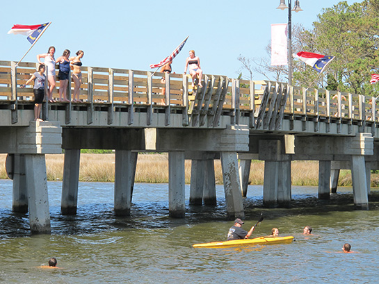 Jumping off bridge in Manteo