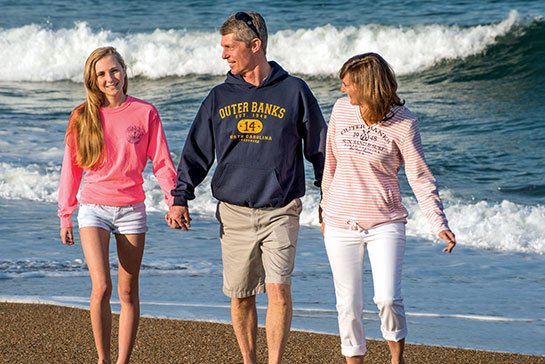 Family wearing clothing from Gray's Gifts and Beach Accessories