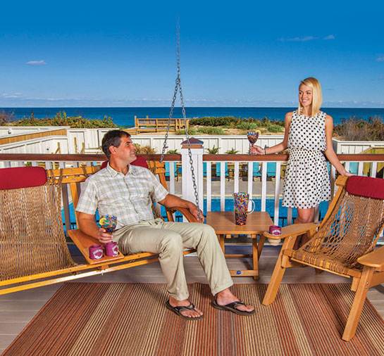 Couple relexing on Nags Head Hammocks