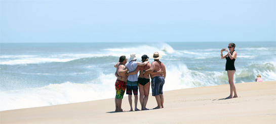 Taking family photo on Hatteras beach