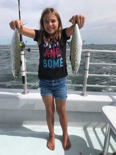 Crystal Dawn Head Boat Fishing and Evening Cruise, Young Manteo angler shows off her double header Spanish mackerel!
