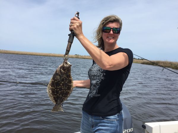 T-Time Charters, Jen got us started with a 14" flounder