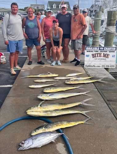 Bite Me Sportfishing Charters, Dolphins and a tuna