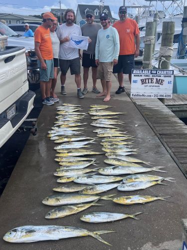 Bite Me Sportfishing Charters, Dolphins and a Sailfish