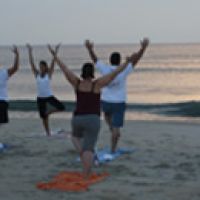 How about some yoga on the beach this week? How about some yoga on the beach this week?