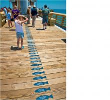Sponsor a plank, get an engraved fish at Jennette's Pier.
