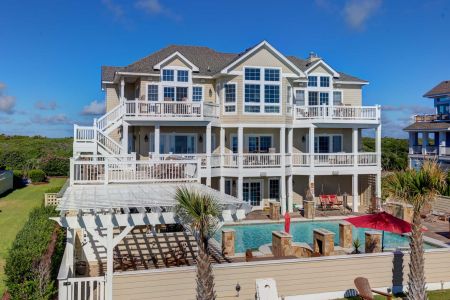 Coast Realty, Heels in the Sand