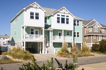 Twiddy & Company Realtors, Bikinis and Martinis