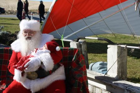 Kitty Hawk Surf Co., Hanging with Santa - Free Photos with Santa